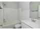 Bright bathroom with white subway tile, shower-tub combo, and granite countertop at 321 Bluestem Ln, Whiteland, IN 46184