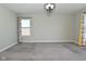 This neutral bedroom has wall to wall carpeting, lots of light, and ample closet space at 321 Bluestem Ln, Whiteland, IN 46184