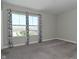 Bedroom with neutral carpet, gray walls, and window with patterned curtains at 321 Bluestem Ln, Whiteland, IN 46184