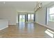 Inviting living room with lots of natural light and open access to dining area at 321 Bluestem Ln, Whiteland, IN 46184