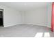 Large living room with plush carpet and natural light at 321 Bluestem Ln, Whiteland, IN 46184
