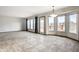 Bright living room with a door to a patio, and a beautiful lake view at 3634 W 58Th St, Indianapolis, IN 46228