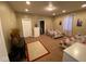 A spacious bedroom featuring two beds, neutral walls, a white dresser, and a glimpse into an attached bathroom at 3818 Graceland Ave, Indianapolis, IN 46208