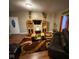Inviting living room boasts hardwood floors and a cozy seating arrangement at 3818 Graceland Ave, Indianapolis, IN 46208