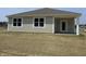 Charming single story home with a covered porch, newly built with fresh grass and white trim at 3915 Donaldson Creek Ct, Clayton, IN 46118