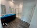 The spacious bathroom with double sink vanity and walk-in shower are sure to impress at 3933 Donaldson Creek Ct, Clayton, IN 46118