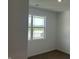 Well-lit bedroom with carpeted floors and a window offering a view of the outdoors at 3933 Donaldson Creek Ct, Clayton, IN 46118