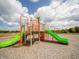 Outdoor playground featuring colorful slides and climbing structures in a modern community park at 3933 Donaldson Creek Ct, Clayton, IN 46118