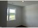 Bright bedroom featuring carpeted floors, white walls, recessed lighting, and a window at 3949 Donaldson Creek Ct, Clayton, IN 46118