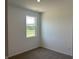 Bright bedroom featuring carpeted floors, white walls, recessed lighting, and a window at 3949 Donaldson Creek Ct, Clayton, IN 46118