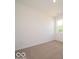 Bedroom featuring neutral carpet, a window, and white walls at 3949 Donaldson Creek Ct, Clayton, IN 46118