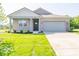 Charming single-story home with a well-maintained lawn and neutral-colored exterior at 3949 Donaldson Creek Ct, Clayton, IN 46118
