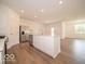 Open-concept kitchen featuring stainless steel appliances and an island at 3949 Donaldson Creek Ct, Clayton, IN 46118