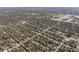 An aerial view of a well-organized neighborhood with a racetrack in the distance at 3970 Broadway St, Indianapolis, IN 46205