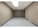 Unfinished basement with concrete floor and grey walls at 3970 Broadway St, Indianapolis, IN 46205