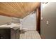 This bathroom features a vanity with sink, tiled floors and shower at 3970 Broadway St, Indianapolis, IN 46205