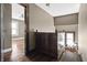 Upstairs hallway featuring wood floors and window seat at 3970 Broadway St, Indianapolis, IN 46205