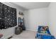 The bedroom includes a playful theme, accented by star curtains and a themed bedspread at 49 Fountain Lake Dr, Greenfield, IN 46140