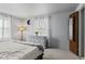 Comfortable bedroom setup featuring soft lighting and a white dresser at 49 Fountain Lake Dr, Greenfield, IN 46140