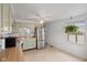 A functional kitchen with well-maintained cabinets and stainless steel appliances at 49 Fountain Lake Dr, Greenfield, IN 46140
