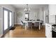 Inviting dining room with a white table, stylish chairs, and access to the kitchen at 5252 N College Ave, Indianapolis, IN 46220