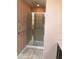 This bathroom offers a shower with glass doors and chrome fixtures at 5329 Hawks Point Rd, Indianapolis, IN 46226