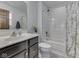 Well-lit bathroom with a shower and tub combo, modern vanity, and neutral color palette at 5524 Coventry Park Way, Indianapolis, IN 46237