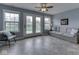 Cozy living room with plenty of natural light and views of the outdoors at 5524 Coventry Park Way, Indianapolis, IN 46237