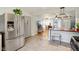 Bright kitchen offering stainless steel appliances, updated cabinets, and an open access to the living area at 5945 Mcfarland Rd, Indianapolis, IN 46227