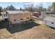 Aerial view of the two-story brick home and surrounding property at 6436 E Hadley Rd, Mooresville, IN 46158