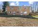 Two-story brick home with a partial view of a fenced yard at 6436 E Hadley Rd, Mooresville, IN 46158