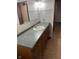 Vanity with mirror and overhead lighting at 7002 Mclain Dr, Indianapolis, IN 46217