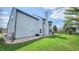 Expansive backyard featuring a well-maintained lawn and bordered by attractive landscaping at 716 Bristol Ct, Greenwood, IN 46143