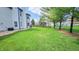 Large, grassy backyard, perfect for recreation, with a fenced perimeter for privacy at 716 Bristol Ct, Greenwood, IN 46143