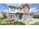 Charming two-story home with brick and vinyl siding and a well-manicured lawn in a lovely neighborhood at 716 Bristol Ct, Greenwood, IN 46143