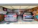 Spacious two-car garage featuring ample storage and parking, plus a workbench area at 716 Bristol Ct, Greenwood, IN 46143