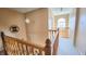 Second floor hallway with natural light and a view to a window at 716 Bristol Ct, Greenwood, IN 46143