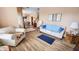 Bright and spacious living room featuring hardwood floors and neutral walls adjacent to a dining room at 716 Bristol Ct, Greenwood, IN 46143