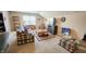 Cozy living room with plush seating, a TV, a decorative rug, and ample natural light at 716 Bristol Ct, Greenwood, IN 46143