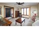 Cozy living room featuring an entry way and large window at 7608 Andrew Turn, Plainfield, IN 46168