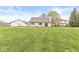 Expansive backyard with lush green grass, perfect for outdoor activities and relaxation at 7715 High View Cir, Indianapolis, IN 46236