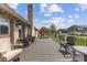 Back deck featuring outdoor furniture, grill, and a beautiful view of the backyard at 8095 Christopher Ct, Avon, IN 46123