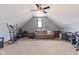 Versatile bonus room with carpet, exercise equipment, and desk space for work or hobbies at 8095 Christopher Ct, Avon, IN 46123