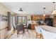 Bright dining area with hardwood floors and large windows overlooking the backyard at 8095 Christopher Ct, Avon, IN 46123