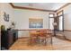 Elegant dining room with a wood table, natural light, and stylish decor at 8095 Christopher Ct, Avon, IN 46123