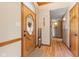 Inviting foyer with a decorative glass door and wood flooring at 8095 Christopher Ct, Avon, IN 46123