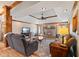 Comfortable living room with a fireplace, trey ceiling, and plush seating, perfect for relaxation at 8095 Christopher Ct, Avon, IN 46123
