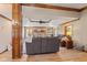 Cozy living room showcasing a fireplace, wood trim, trey ceiling, and comfortable seating at 8095 Christopher Ct, Avon, IN 46123