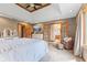 Spacious main bedroom featuring tray ceilings and french doors at 8095 Christopher Ct, Avon, IN 46123