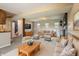 Spacious finished basement with a cozy seating area, fireplace, and neutral decor at 8235 Picadilly Ln, Indianapolis, IN 46256